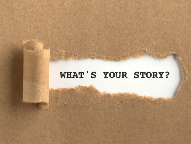a stylised image of brown paper being peeled back to reveal the words 'whats your story?'