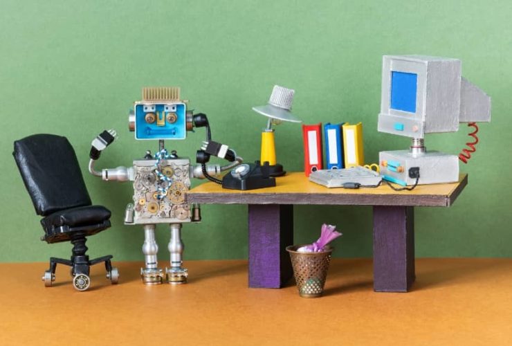 Small robot made from electronic parts with the word “ERROR” on its screen, representing AI for digital marketing issues.