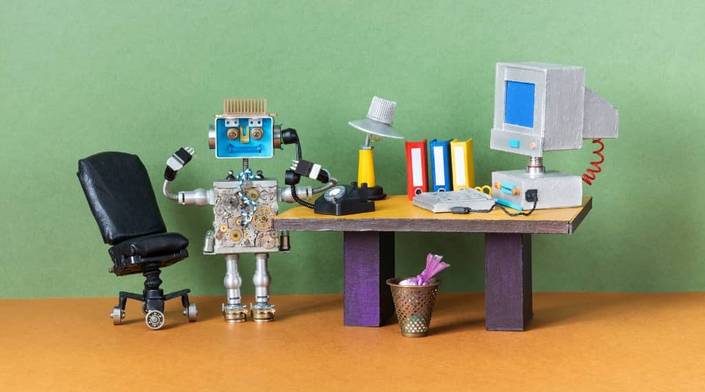 Small robot made from electronic parts with the word “ERROR” on its screen, representing AI for digital marketing issues.
